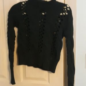 A sweater that allows some skin to show